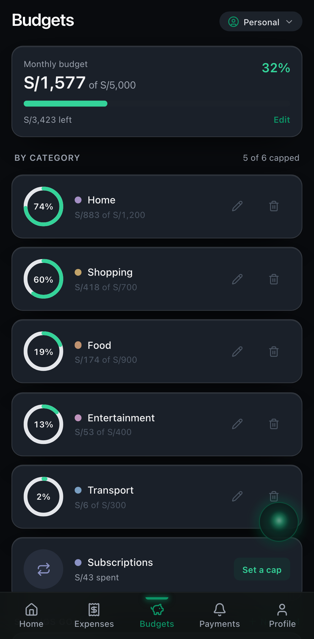Budgets screen with per-category caps and the goals section.